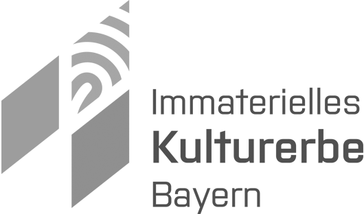 Das Logo 'Immaterielles Kulturerbe Bayern', entworfen von Ingrid und Theresa Schinagl.